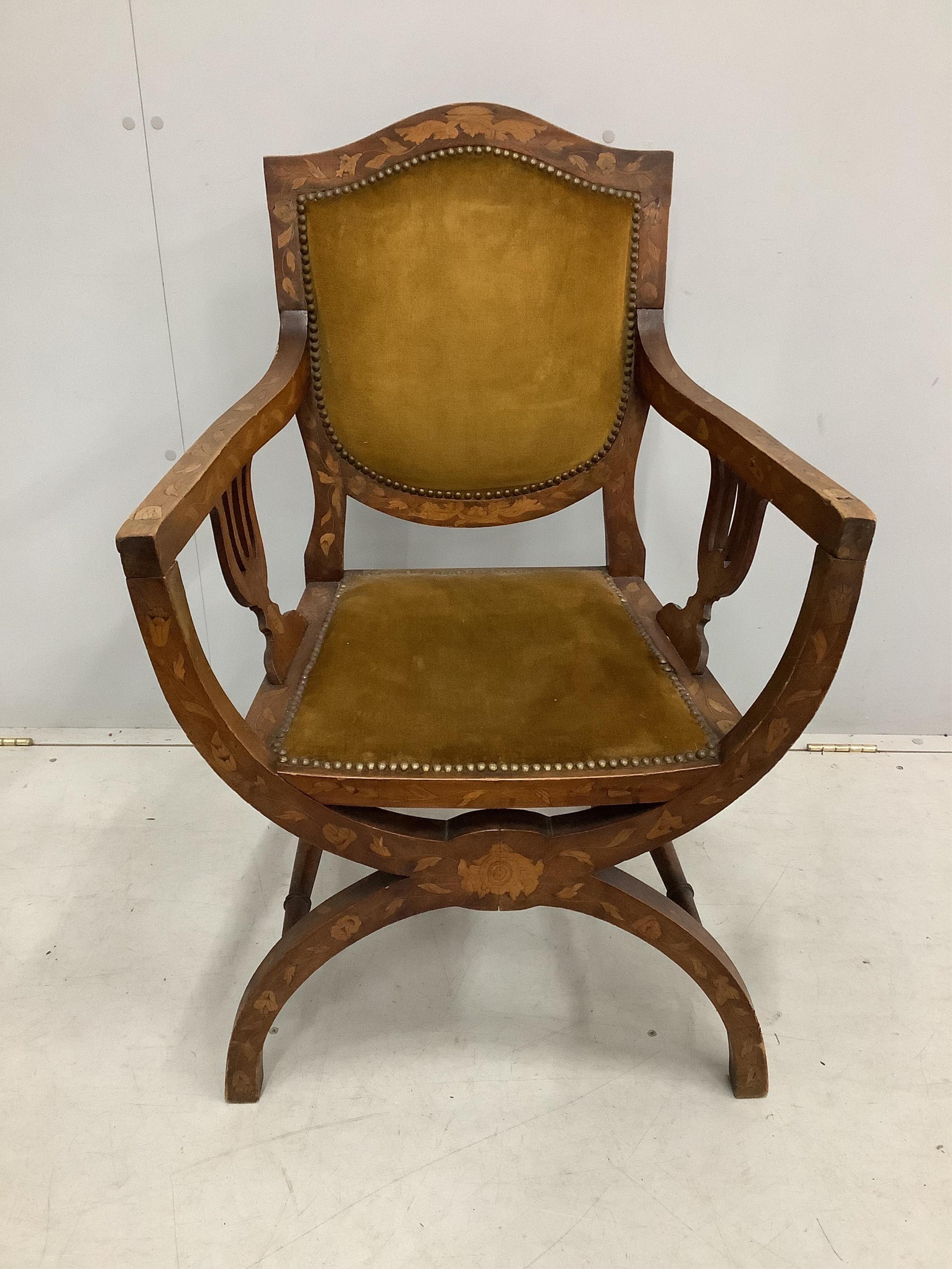 A 19th century Dutch floral marquetry inlaid X frame elbow chair, width 61cm, depth 45cm, height 94cm
